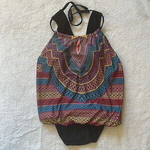 NWT Clearwater one piece swim suit.  Size small.    Ties around neck.